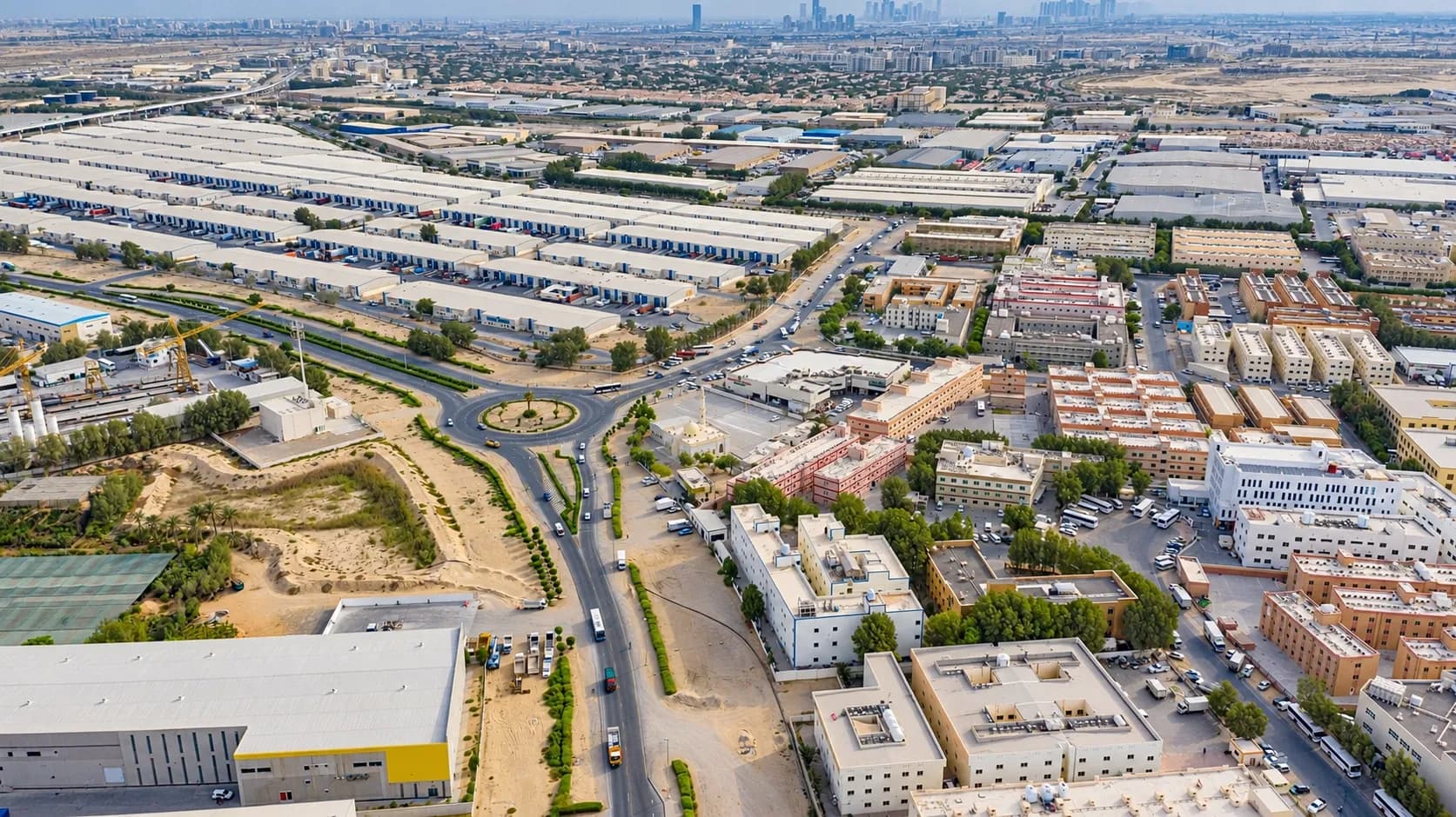Aerial view of logistics buildings, roads and offices at Dubai Investments Park