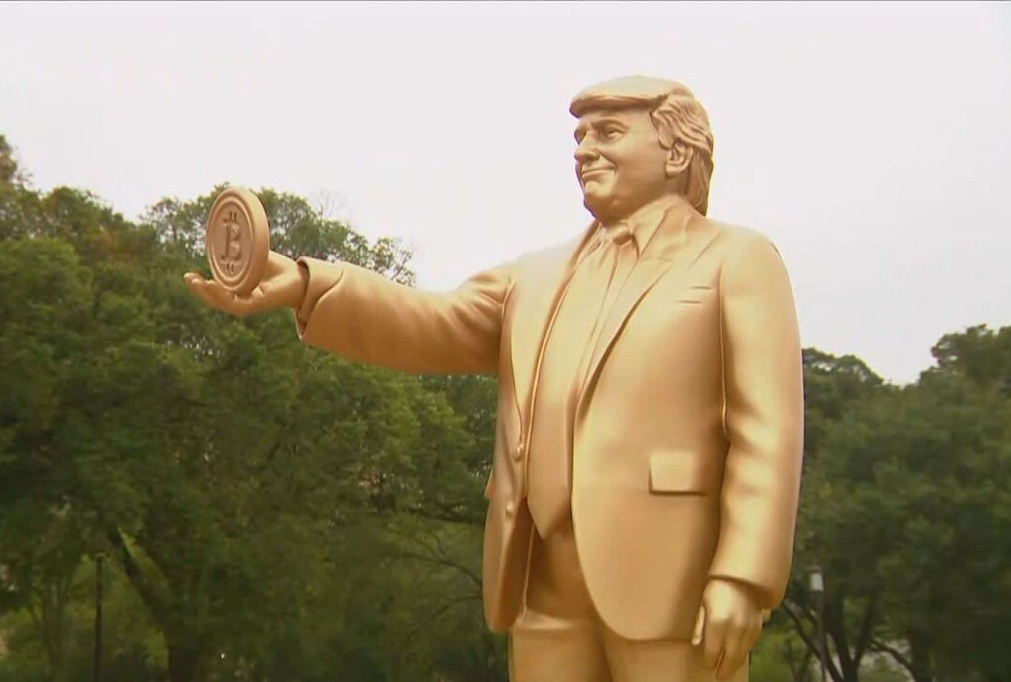 12-Foot Golden Trump Statue with Bitcoin Symbol Rises Outside U.S. Capitol